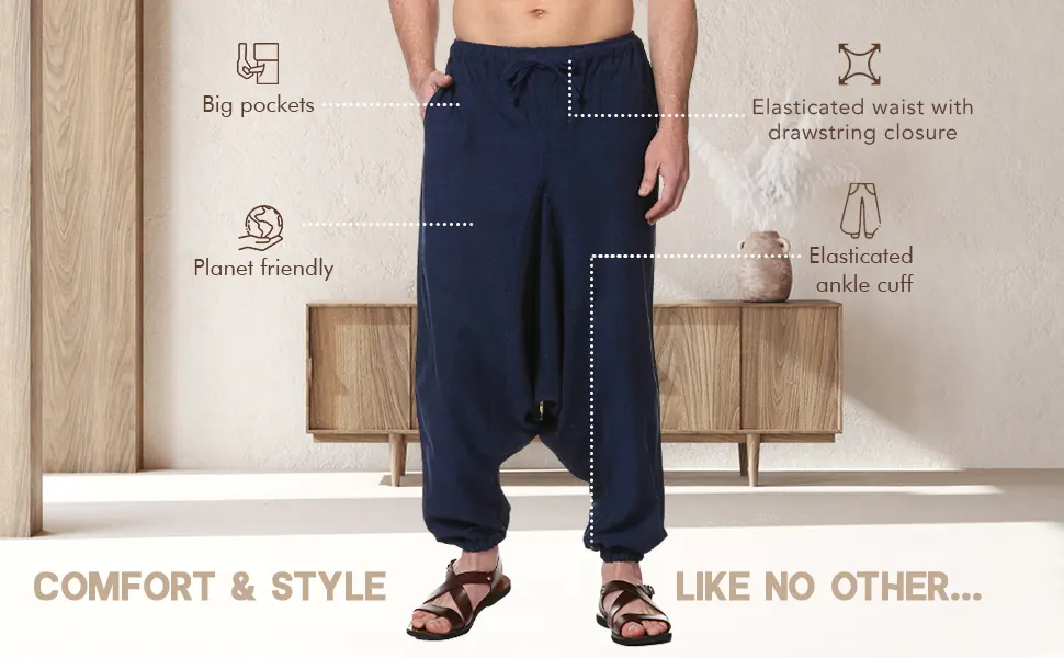 Navy harem pants with callouts for big pockets, planet friendly, an elasticated waist with drawstring and elasticated ankle cuffs: comfort and style like no other