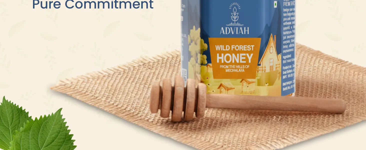 Pure wild honey, pure commitment: the jar on a woven mat with a honey dipper