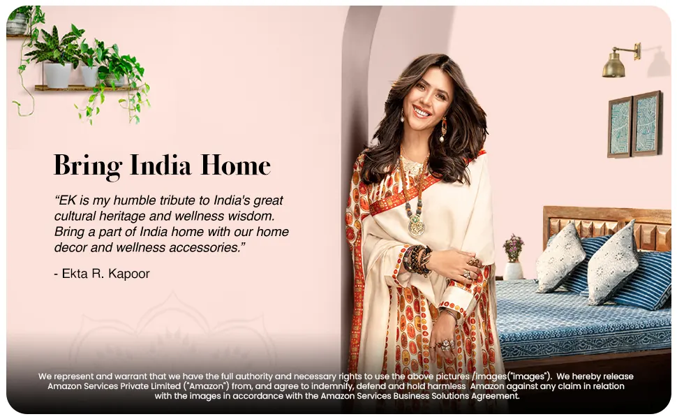 The founder by a bed in a pink room: Bring India Home