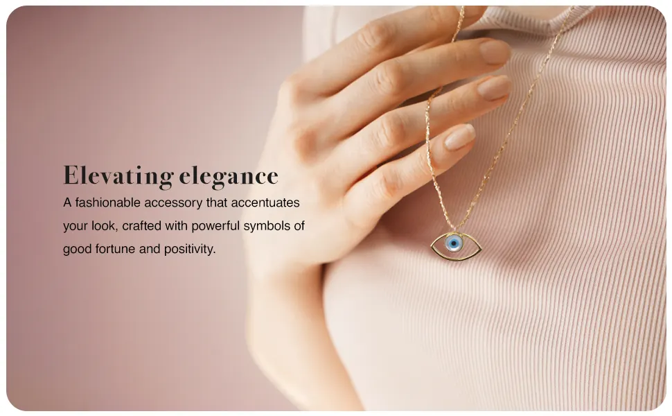 The pendant worn on a pink top: elevating elegance