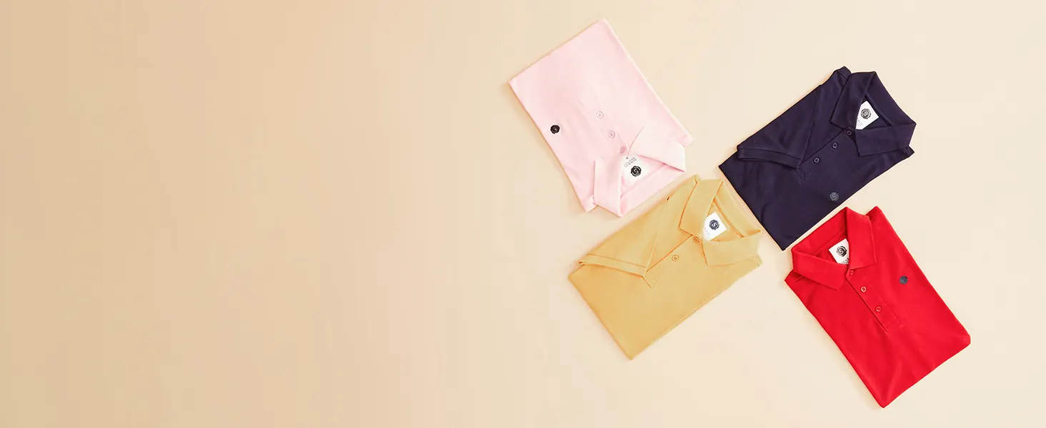 Folded polo shirts in four colours
