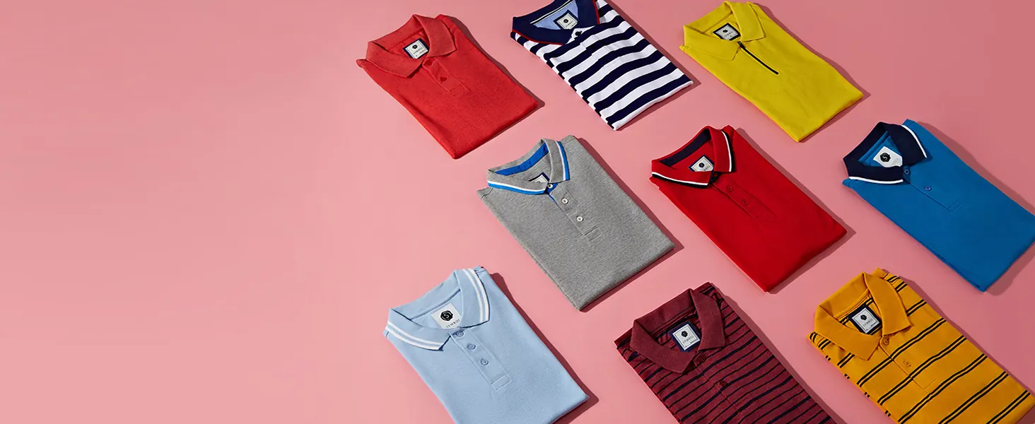 Polo shirts laid flat, in solids and stripes
