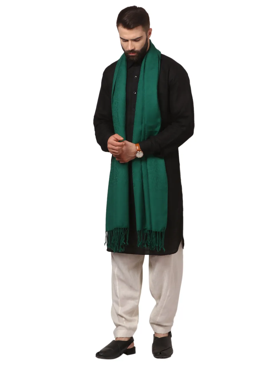 A male model in a black kurta with a bottle-green stole, on white